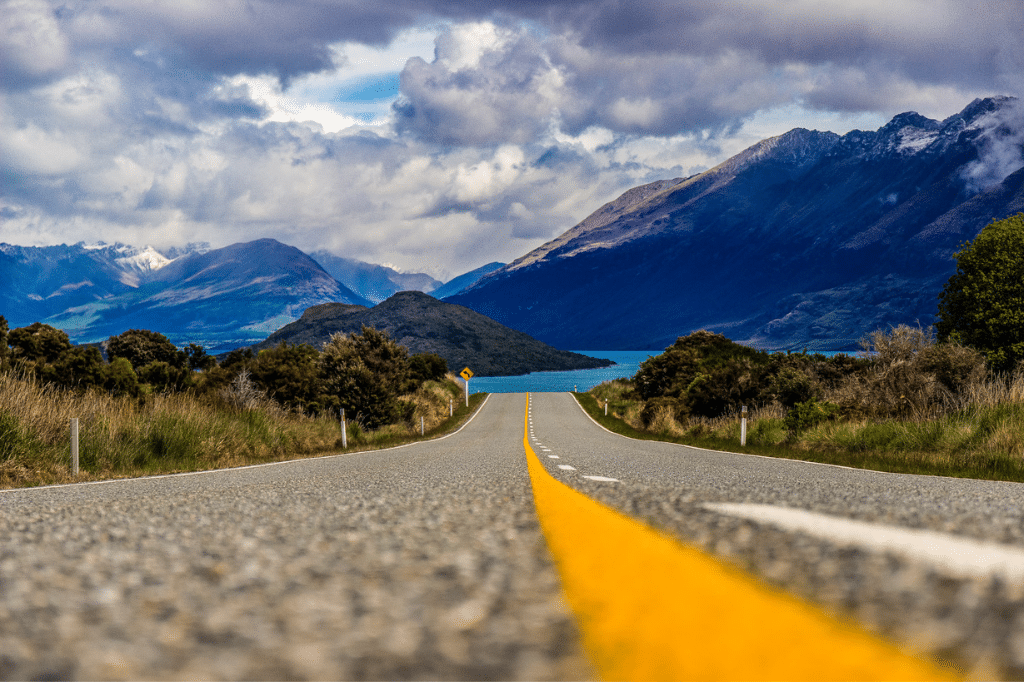 Road leading to mountains in New Zealand
